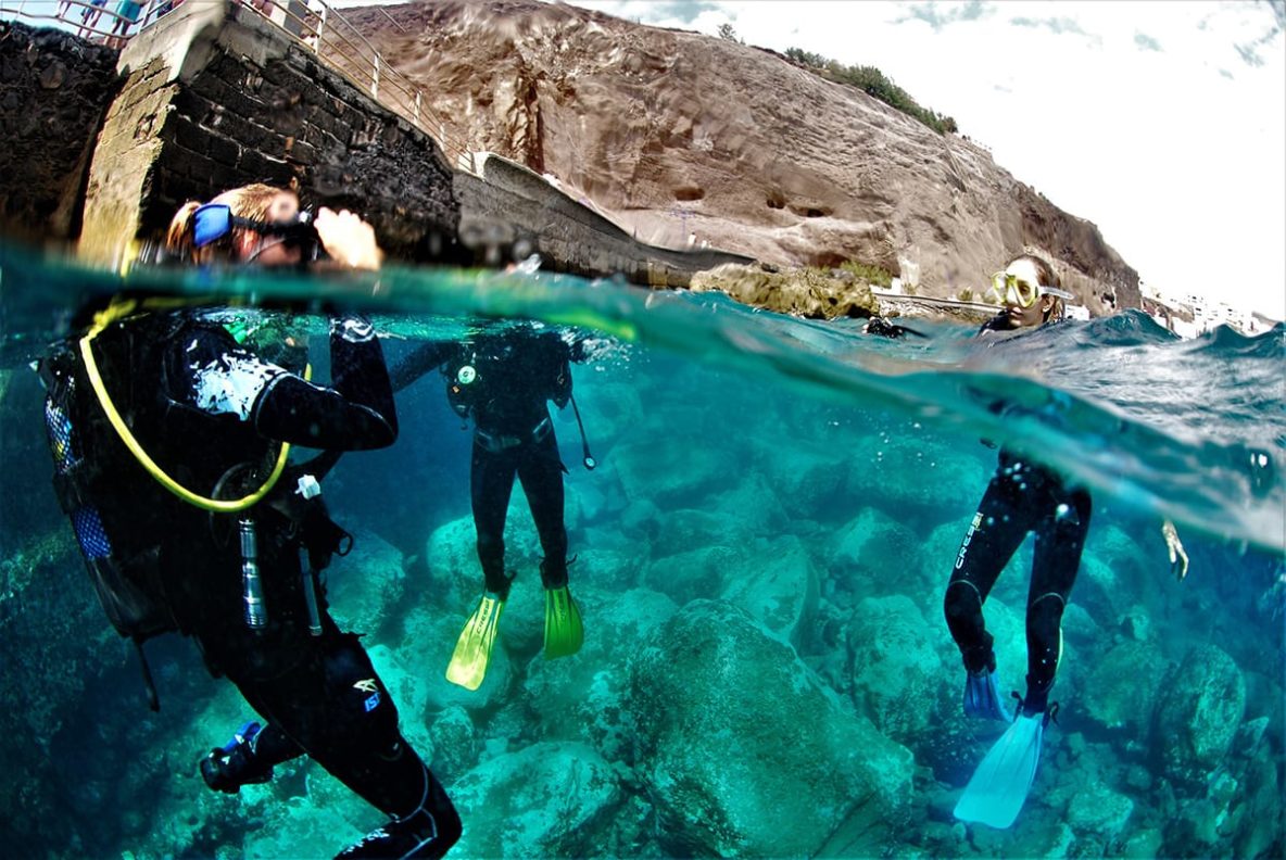 What is a scuba diving baptism like?